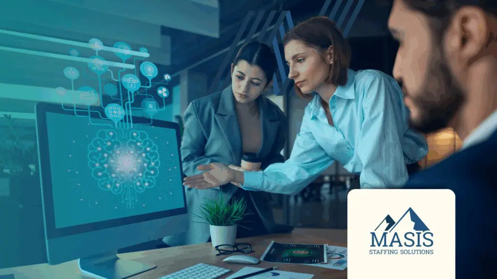 Three people looking at an abstract figure on a computer.