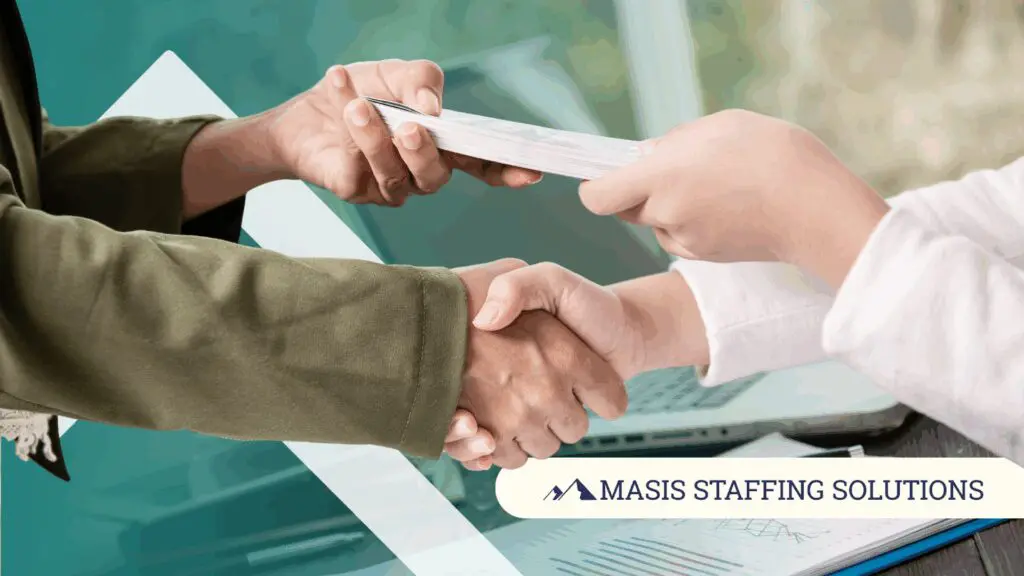 Two professionals shaking hands.