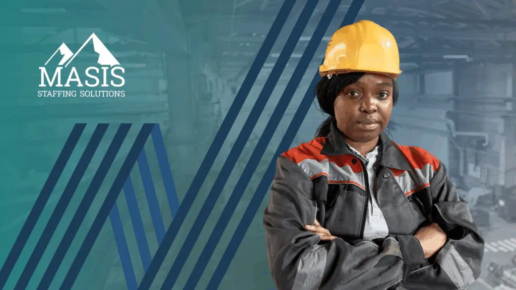 Woman standing confidently in hard hat