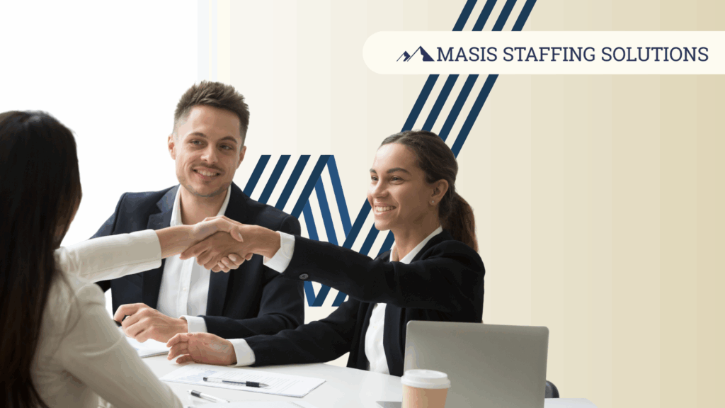 Two recruiters welcoming a new hire