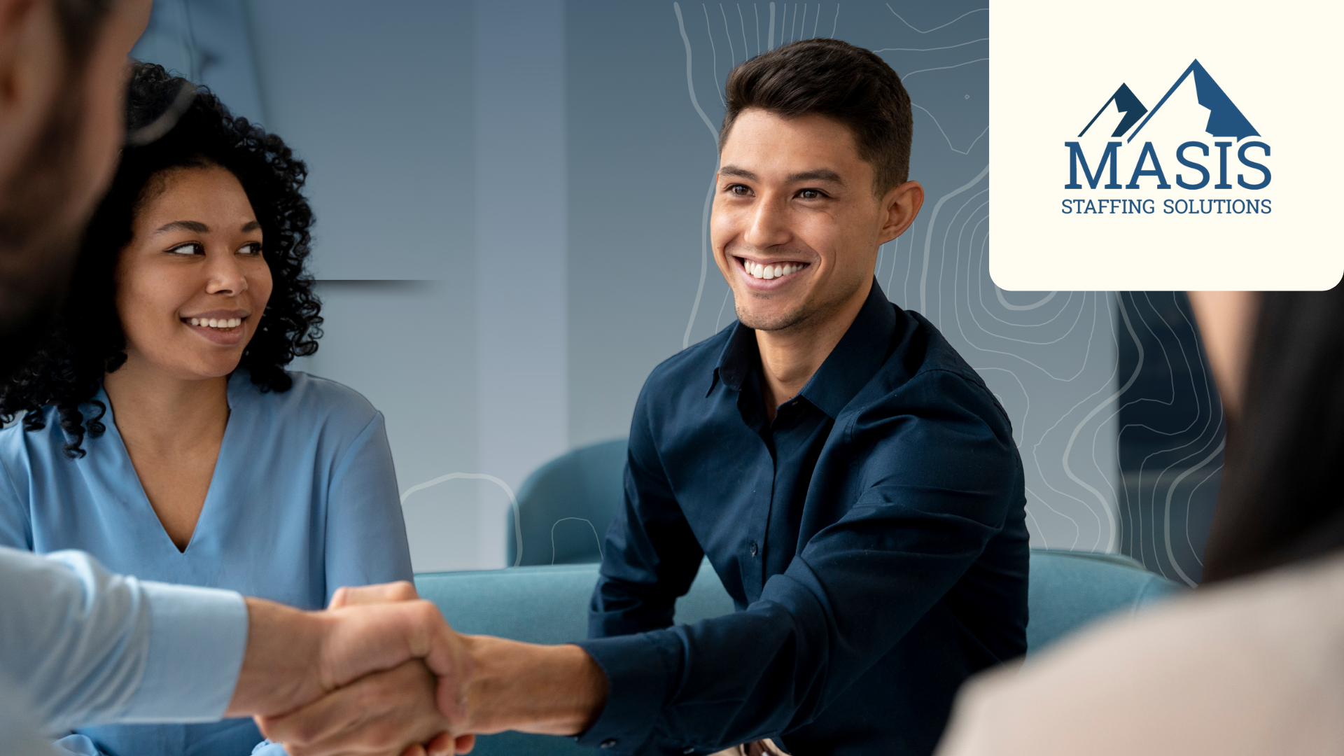 An employer shakes hands with a newly hired employee in Q4