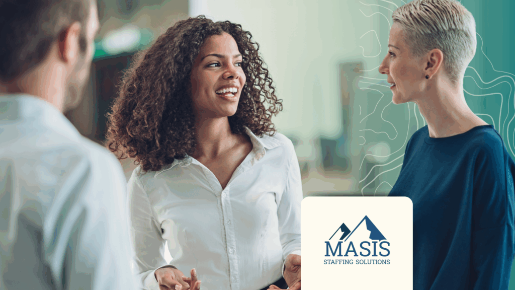 Job seeker speaks with possible job leads at a festive event.