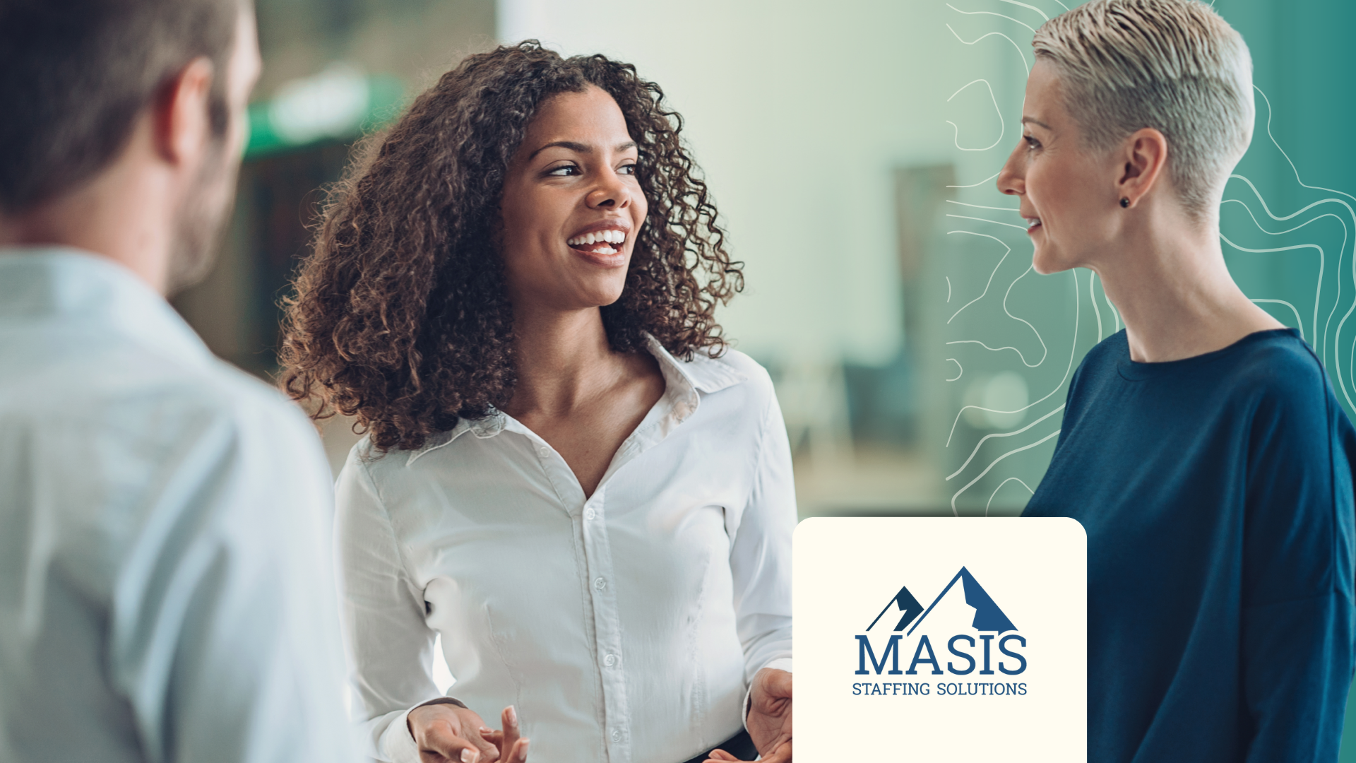 Job seeker speaks with possible job leads at a festive event.