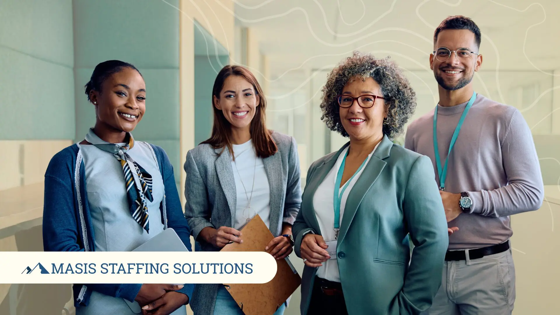 Hired employees stand smiling at the start of the year