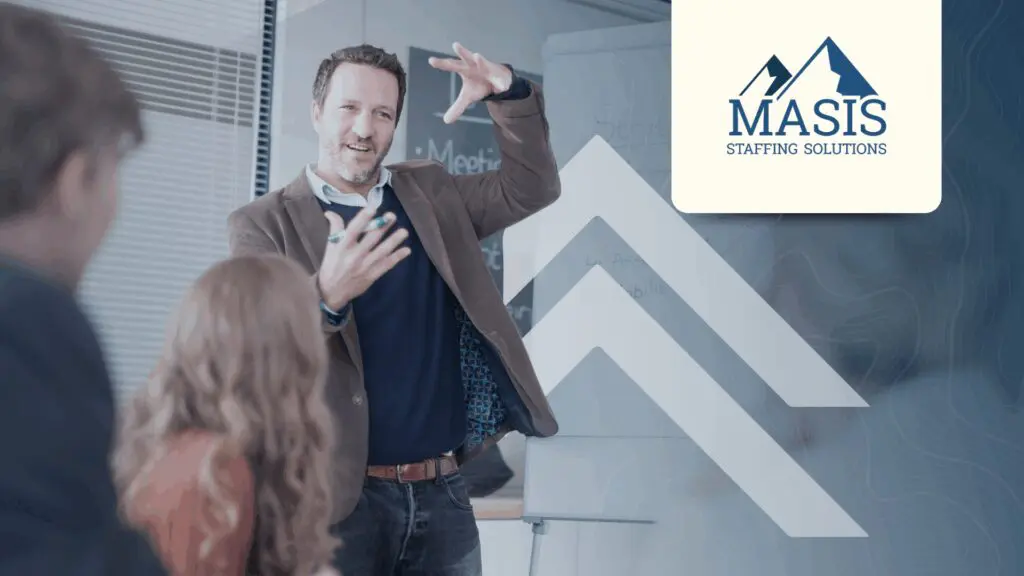 Office employees hold a year-end review.