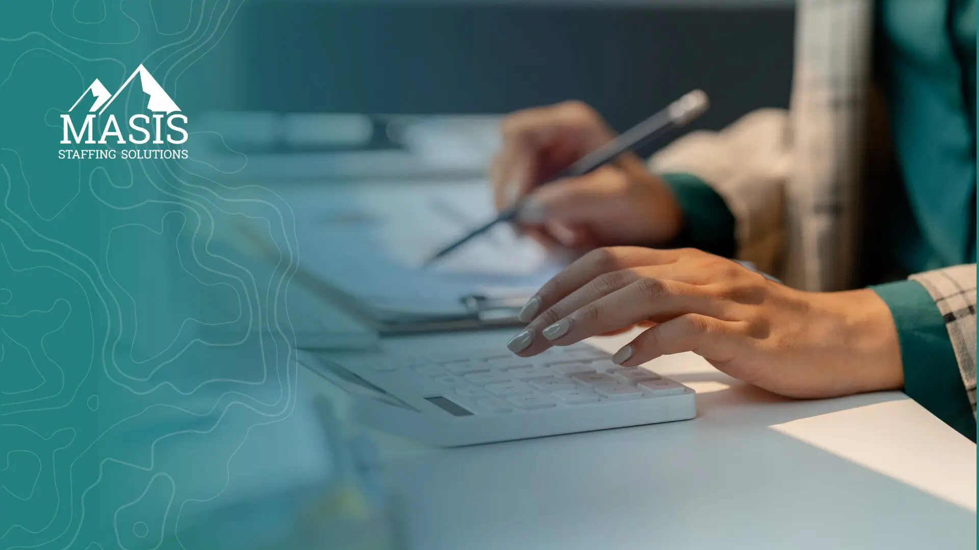 A professional takes notes while using a calculator at a desk, representing the focus and preparation it takes to make a strong impression in a new temp role.