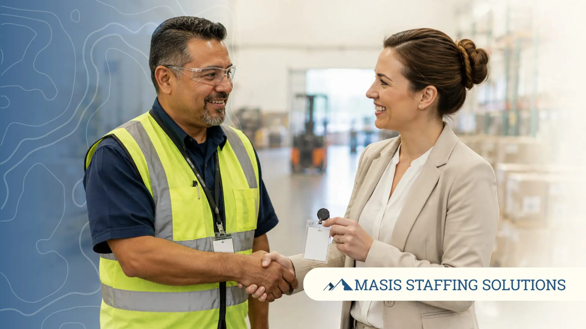 A warehouse worker and a business professional shake hands in a warehouse setting, representing going from temp to permanent employee.