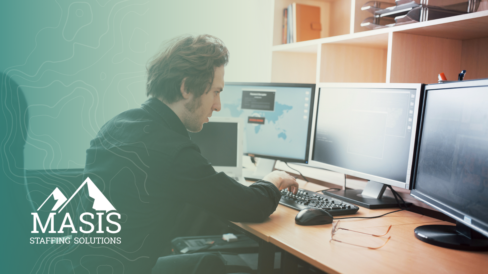 Data entry staff works on a computer