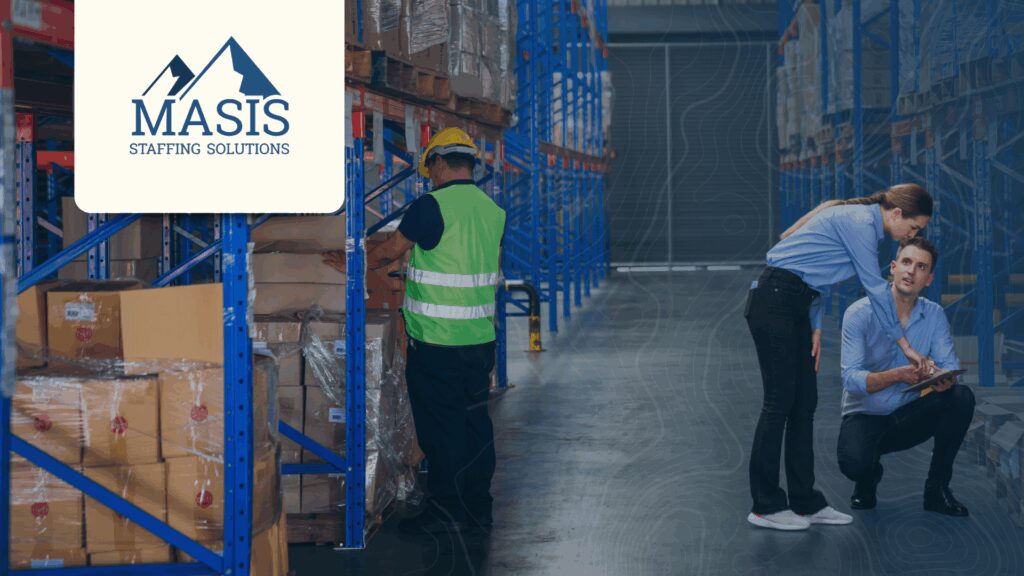 Temporary workers move boxes and discuss in a warehouse setting