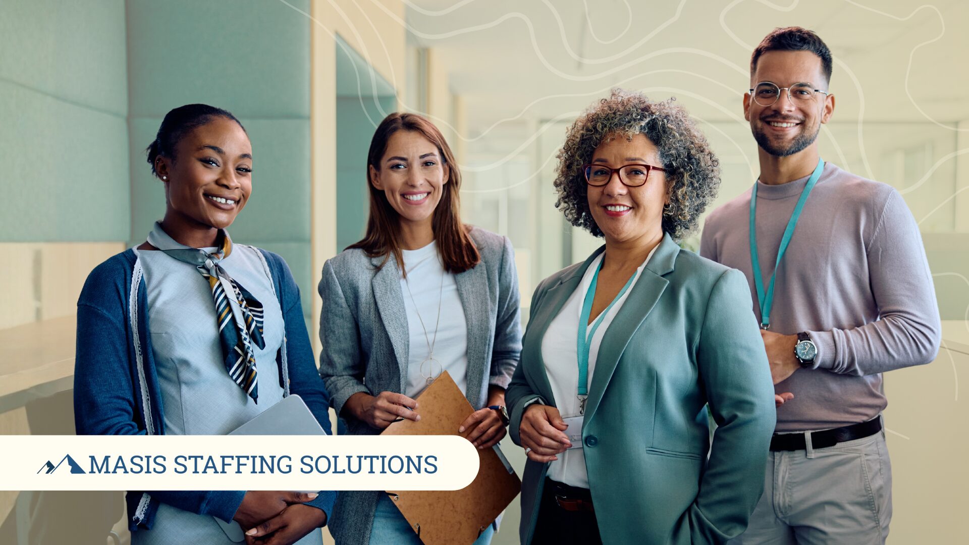 Hired employees stand smiling at the start of the year