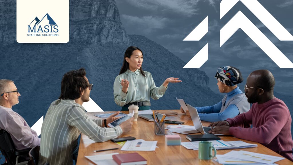 Professionals discuss candidate feedback and experience at a conference table