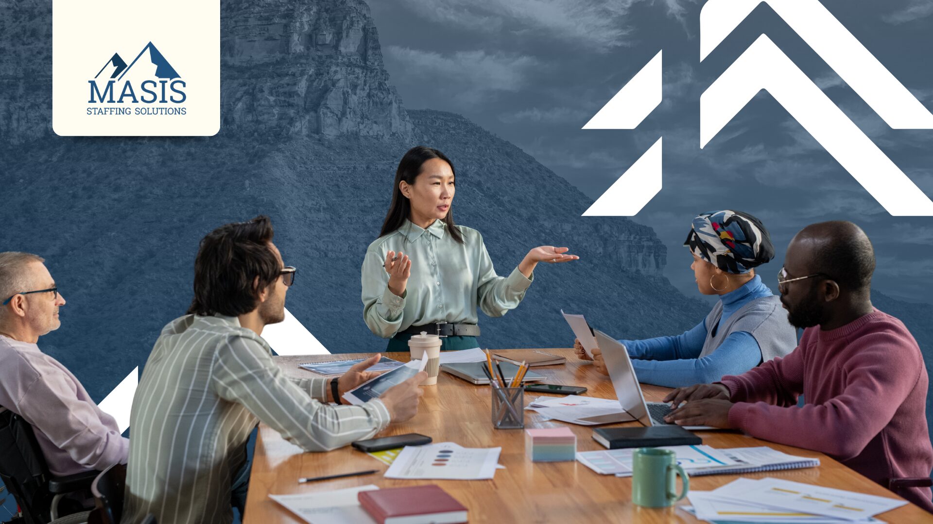 Professionals discuss candidate feedback and experience at a conference table